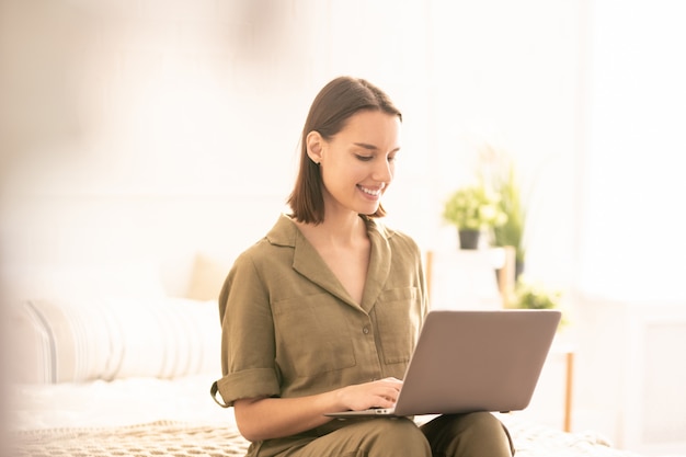 Woman networking at home