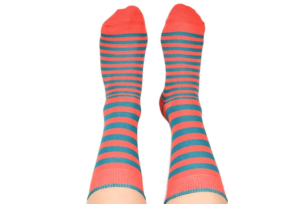 Woman in orange socks isolated on white