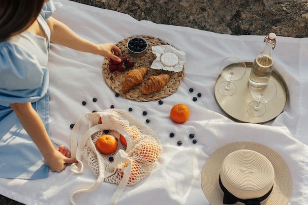 Woman organized picnic on the mountain