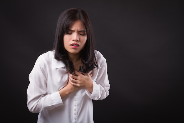 Woman patient suffering from heart attack