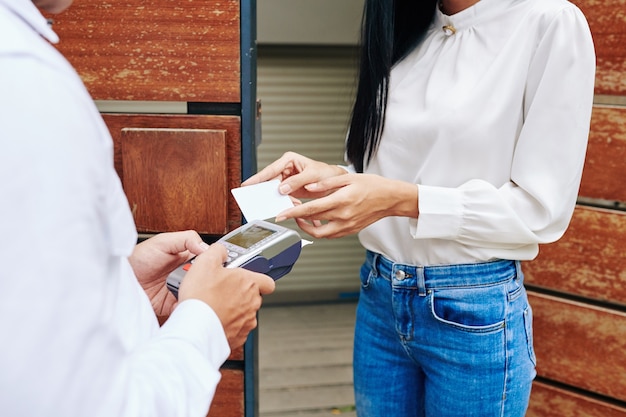 Woman Paying For Delivery