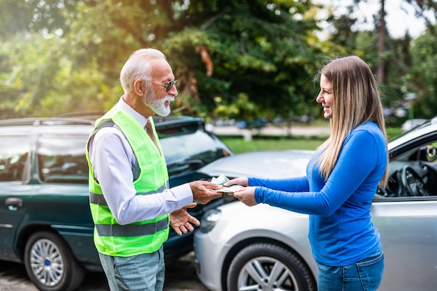 woman pays damage to a senior man because of car crash happened by her fault.
