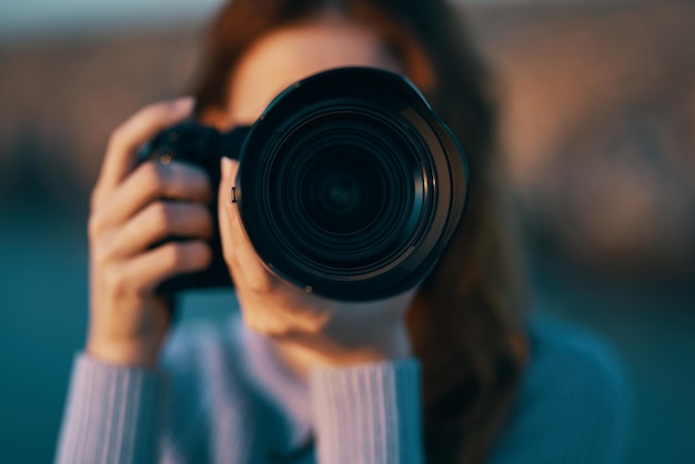 Woman photographer outdoors landscape travel closeup High quality photo