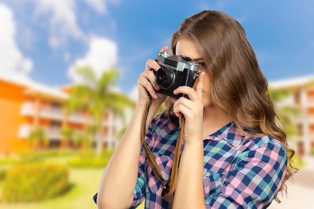 Fotografo di donna con la macchina fotografica