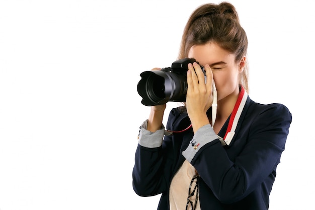 Woman photographer with a DSLR camera