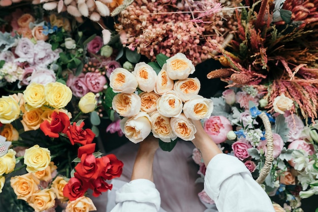 Woman picking up some Romantic Vuvuzela Roses