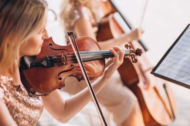 Woman playing music instrument