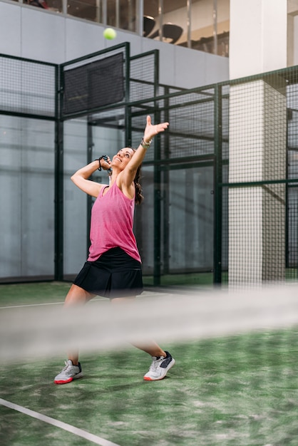 Woman playing padel