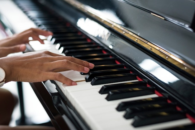 Woman playing on a piano