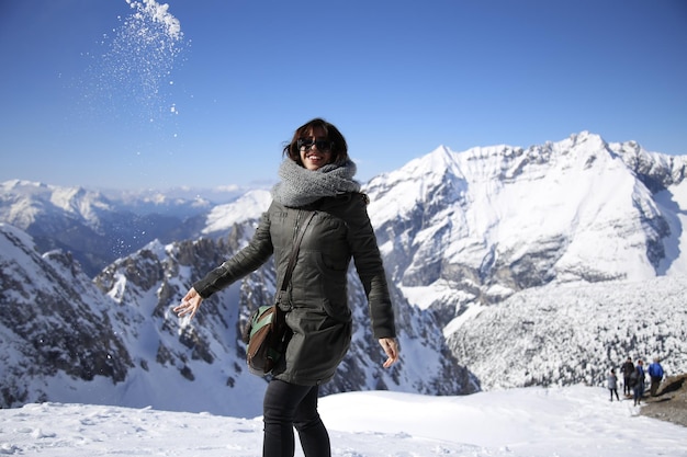 A woman playing at sky station in the city of Innsbruck Austria