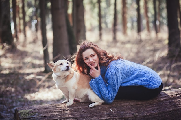 Woman playing with her dog