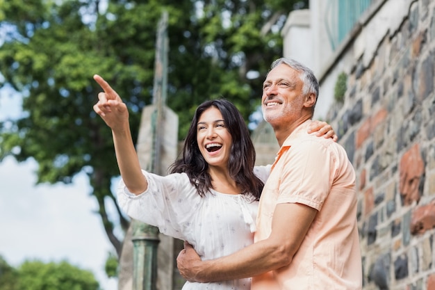 Woman pointing to man