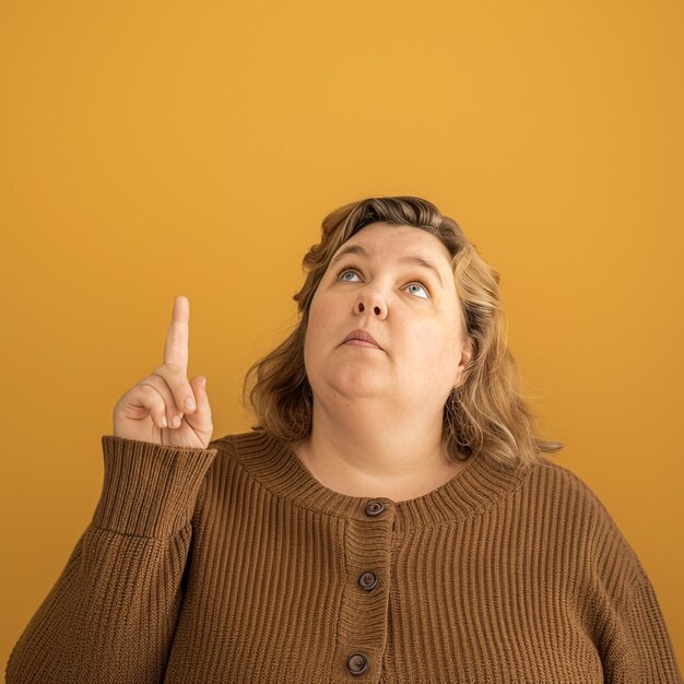 Photo a woman pointing to the right with a finger pointing to the right