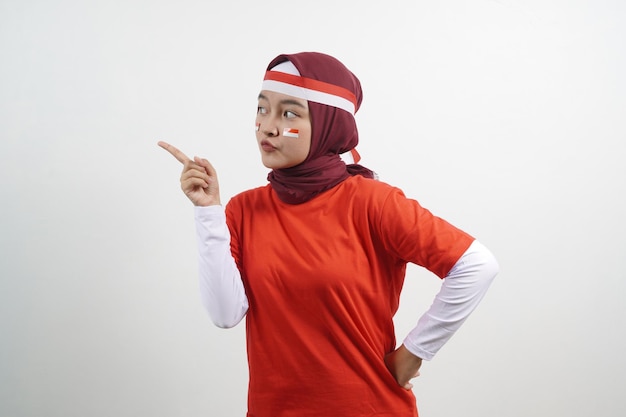 Woman pointing something indonesian independence day concept
