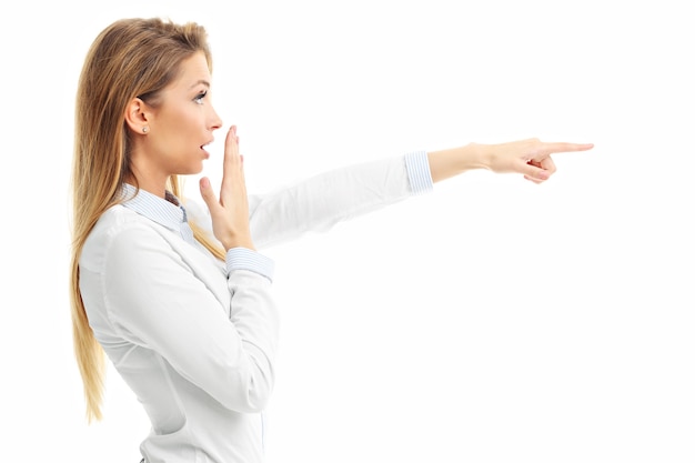 woman pointing over white background