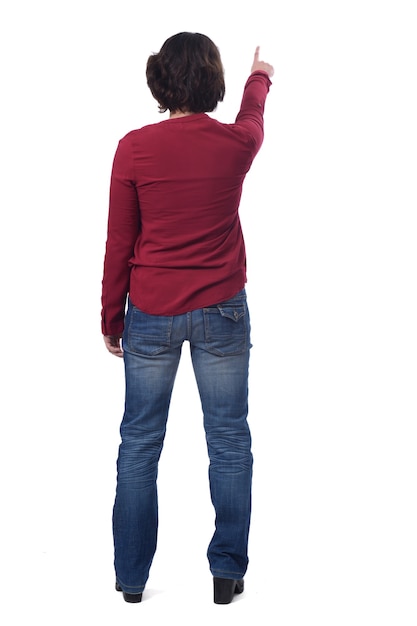 Woman pointing on white background