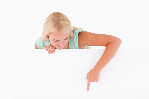 Woman pointing on a whiteboard