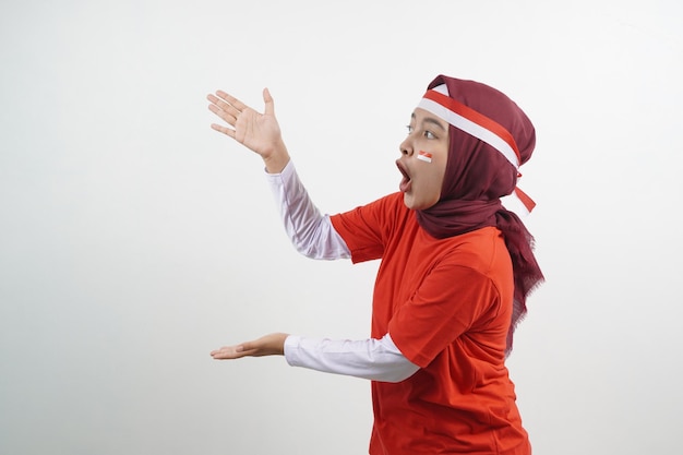 Woman pointing with hand indonesian independence day concept