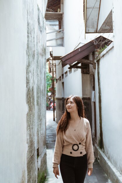 Woman portrait enjoying exploring the city