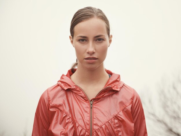 Photo woman portrait and fitness outdoor with fog for hiking exercise and workout in nature with confidence athlete person and face with pride for running training and sportswear for healthy body