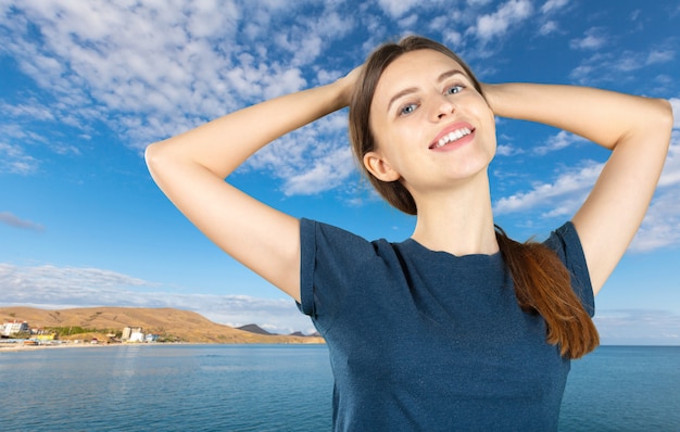 Woman portrait on a landscape