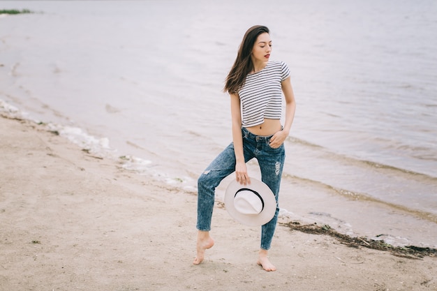 woman posing on the beach