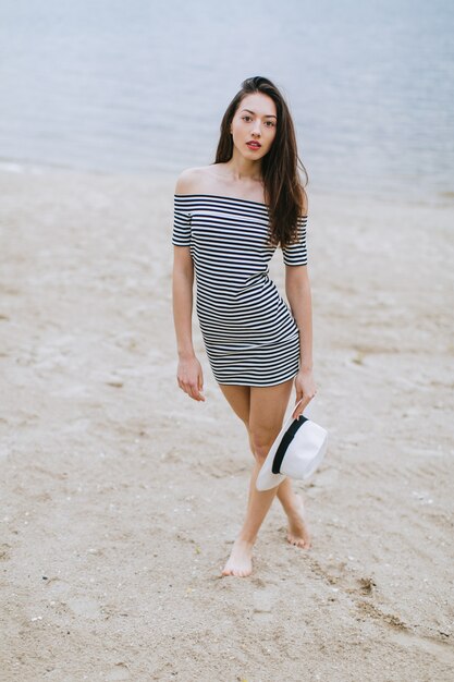 woman posing on the beach