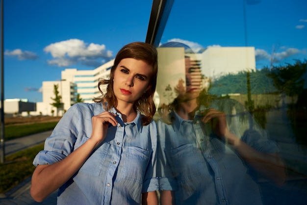 Woman posing outside in a park