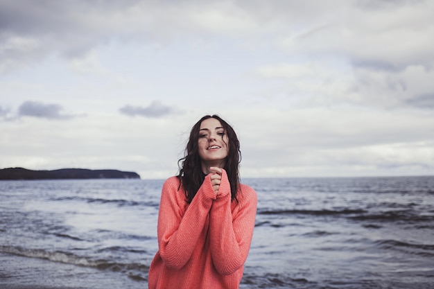 woman posing on the sea coast.