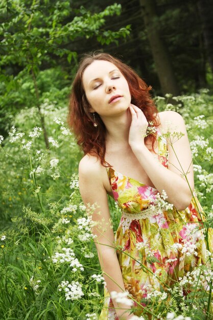 Woman posing in summer park