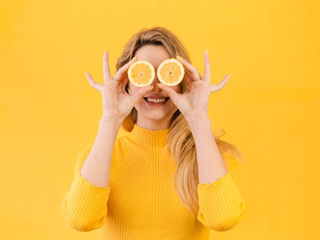 Woman posing with citrus