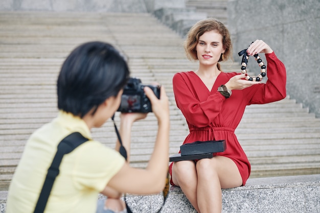 Woman posing with massive necklac