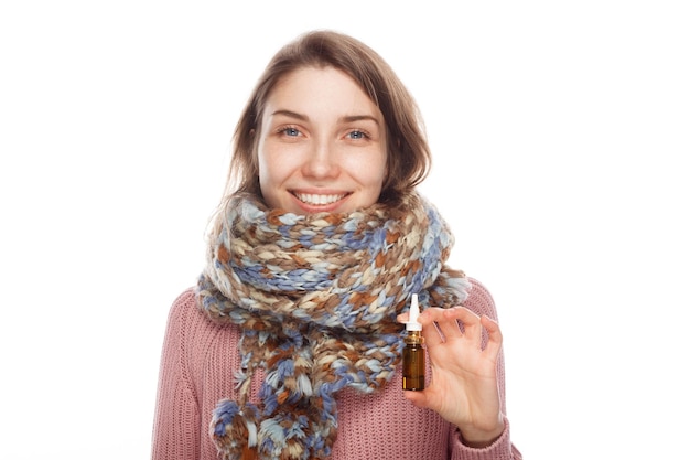 Woman posing with nasal drops