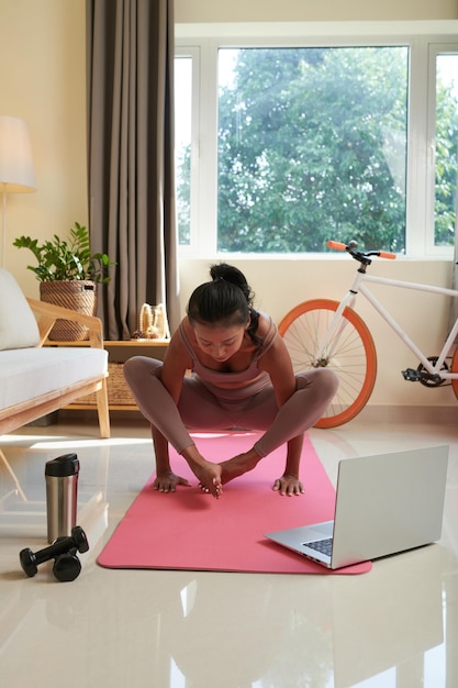 Woman Practicing Handstand at Home