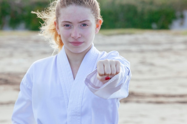 Woman practicing martial arts and feminism empowerment