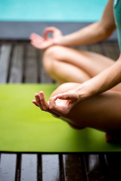 Woman practicing mudra meditation