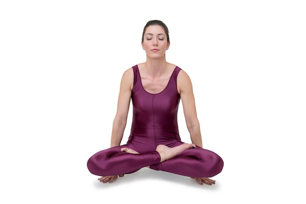 Photo woman practicing yoga in ardha padmasana pose