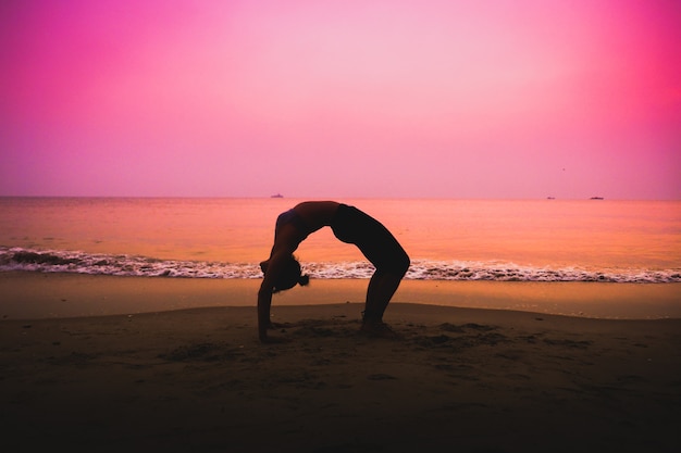 woman practicing yoga