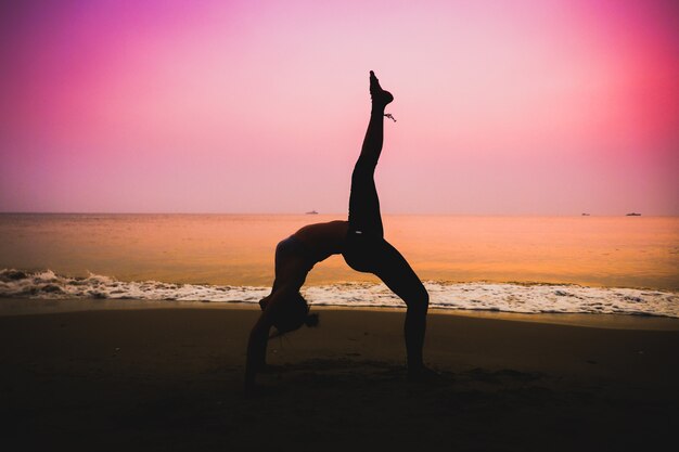 woman practicing yoga