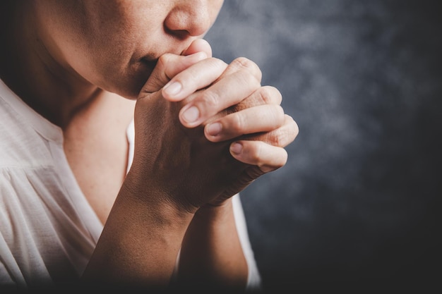 Woman Pray for god blessing to wishing have a better life