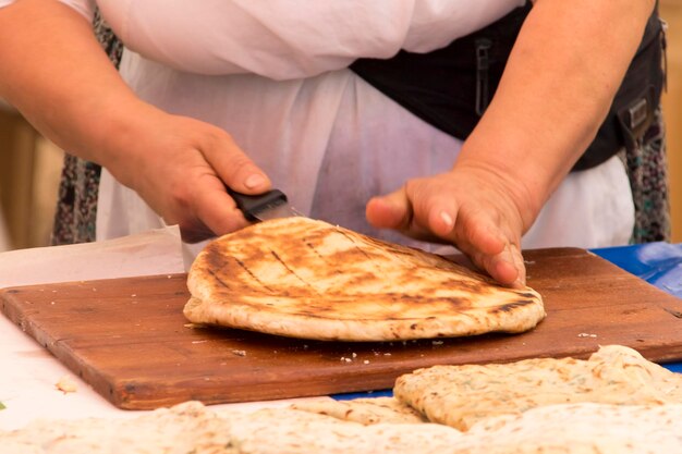 A woman prepares traditional Turkish pastries gozleme