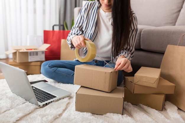 Photo woman preparing cyber monday packages