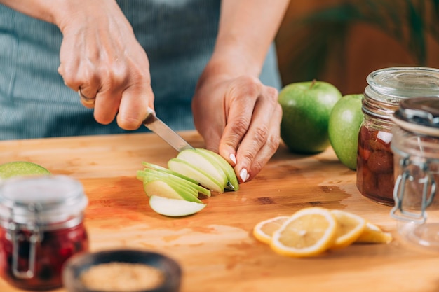 Woman Preparing Fruits for Fermentation