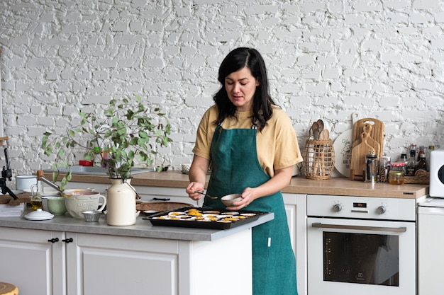 Woman preparing healthy meal in her rustic eco kitchen Slow life