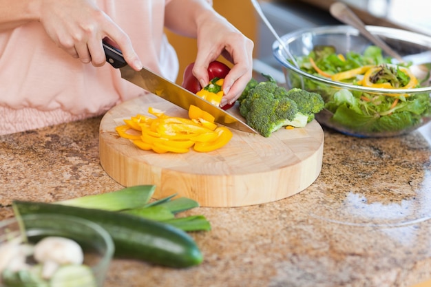 Woman preparing healthy salad