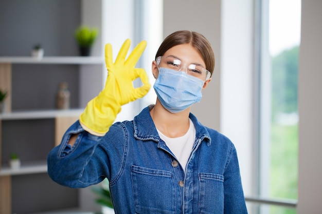 Woman professional cleaner cleans the office of a modern company