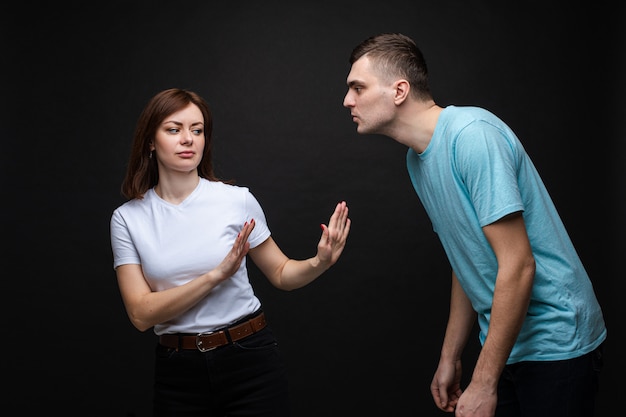 Woman protecting from sick man.