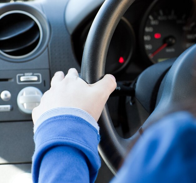 Woman putting on the indicator