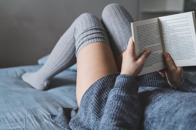 Woman read book in bed. study in bed