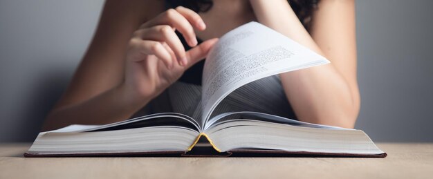 Woman reading book the concept of education